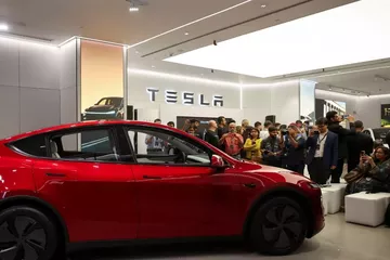 Tesla'nın Kârı, Rekor Satışlara Rağmen Tahminlerin Altında